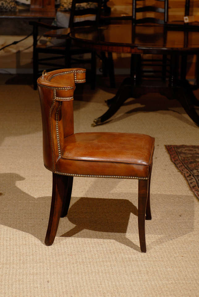 The Handel Leather chair, made in England using Italian leather is a stylish transitional shape with roots in Georgian England.  Designed as a reading chair, ours recreates the characher of antiquity.  The leather is gently aged once it covers the