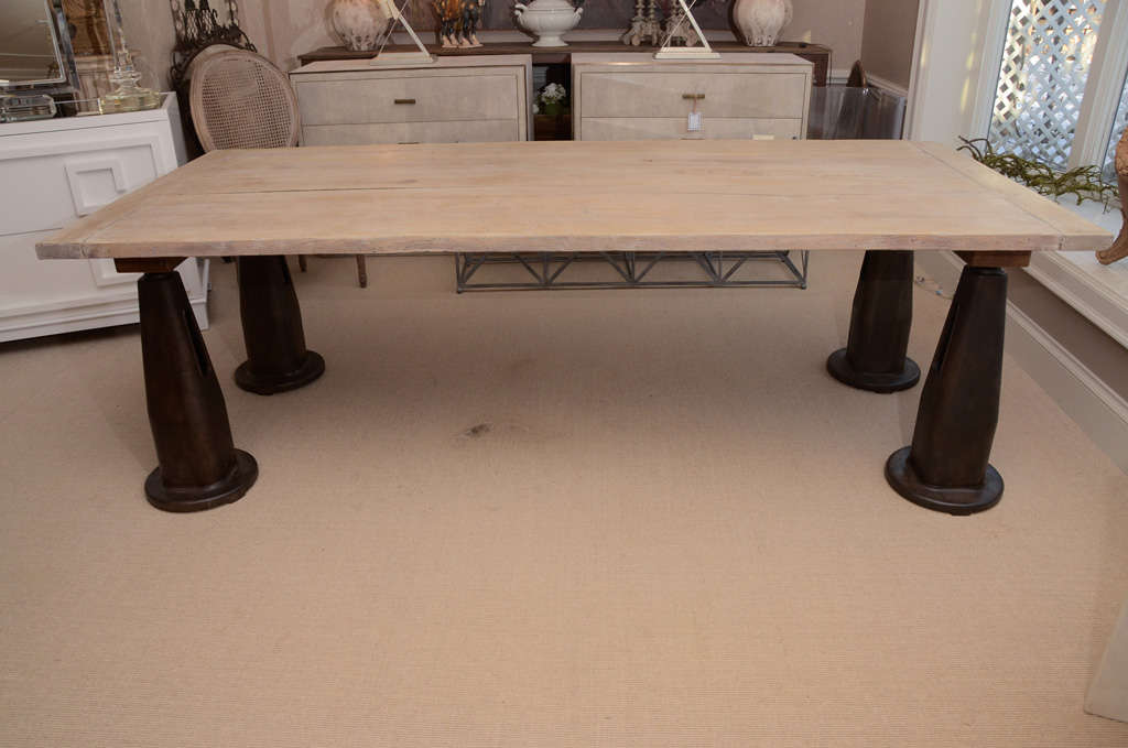 Industrial Cast Iron and Limed oak refectory table. Marine ship ties were used for the legs