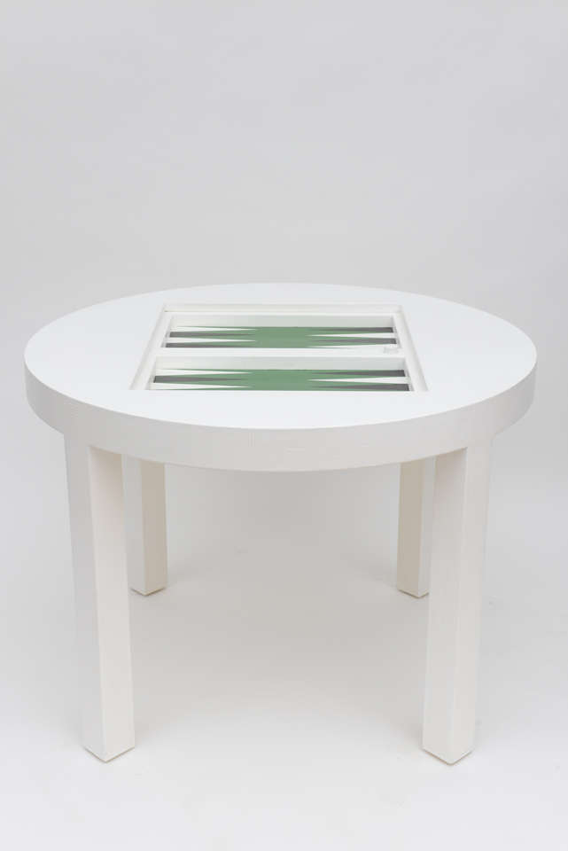 A beautiful faux lizard gametable,with a hidden backgammonn
board inside.Restored finish
