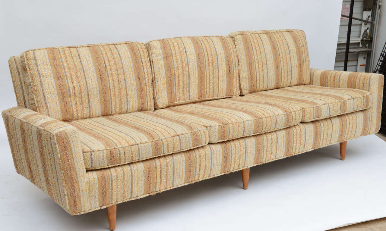 An early example of Florence Knoll's design.
Birch cone legs,reupholstered many years ago.
An extremely comfortable sofa.