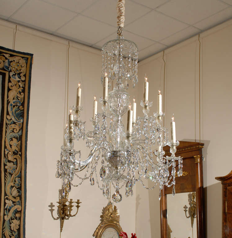 A Waterford 12 light crystal arm chandelier. 

For many more fine antiques, please visit our online gallery at: www.williamwordantiques.com.

William Word Fine Antiques: Atlanta's source for antique interiors since 1956.