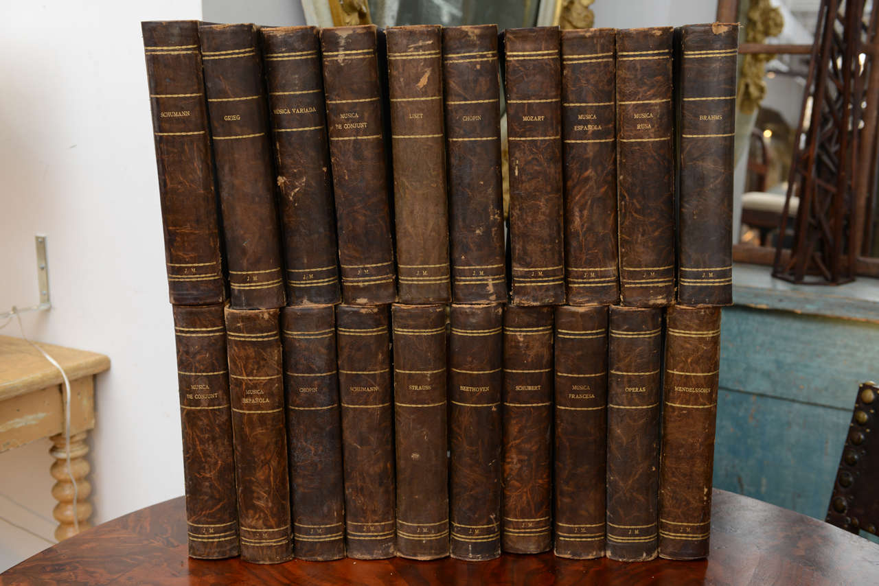 Set of  leather ended sheet music boxes embossed with the names of Schuman, Grieg, Beethovan, Mendelssohn and many others