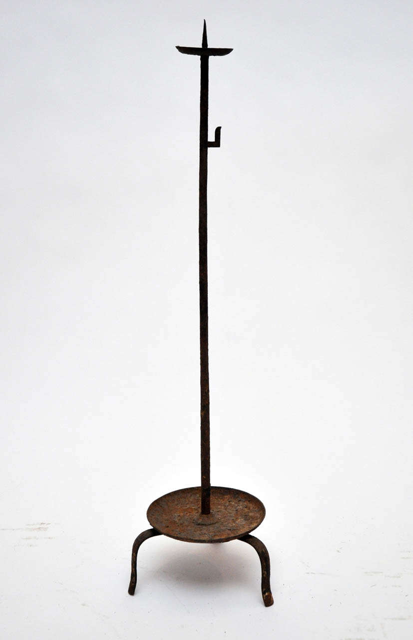 This is a Japanese cast iron candlestick from the early 19th century.

The bottom catcher diameter is 6-3/8