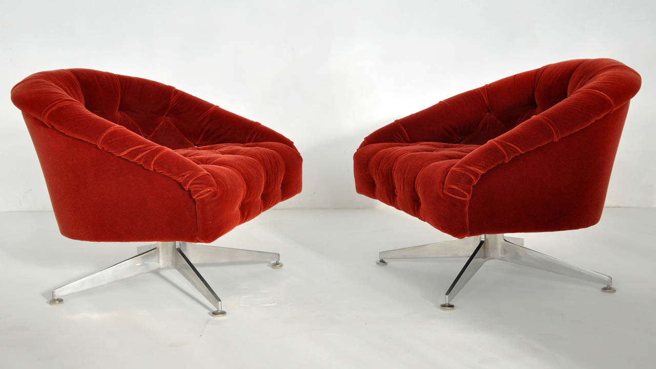 Tufted lounge chairs by Ward Bennett.  Original mohair upholstery over polished aluminum frames.