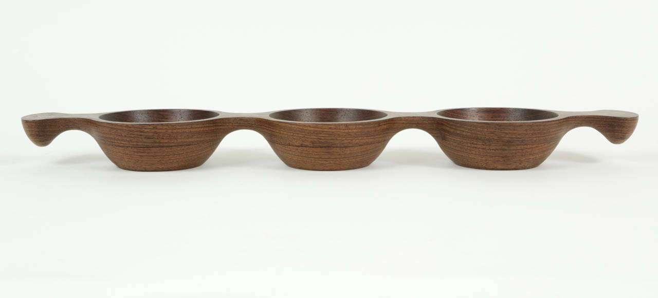 A remarkable serving piece for nuts, olives, etc. by one of Denmark's most extraordinary designer - craftsmen, Thomas Skjøde Knudsen.  Very hard to find in any condition due to the nature of the wood; this example has survived in perfect condition.
