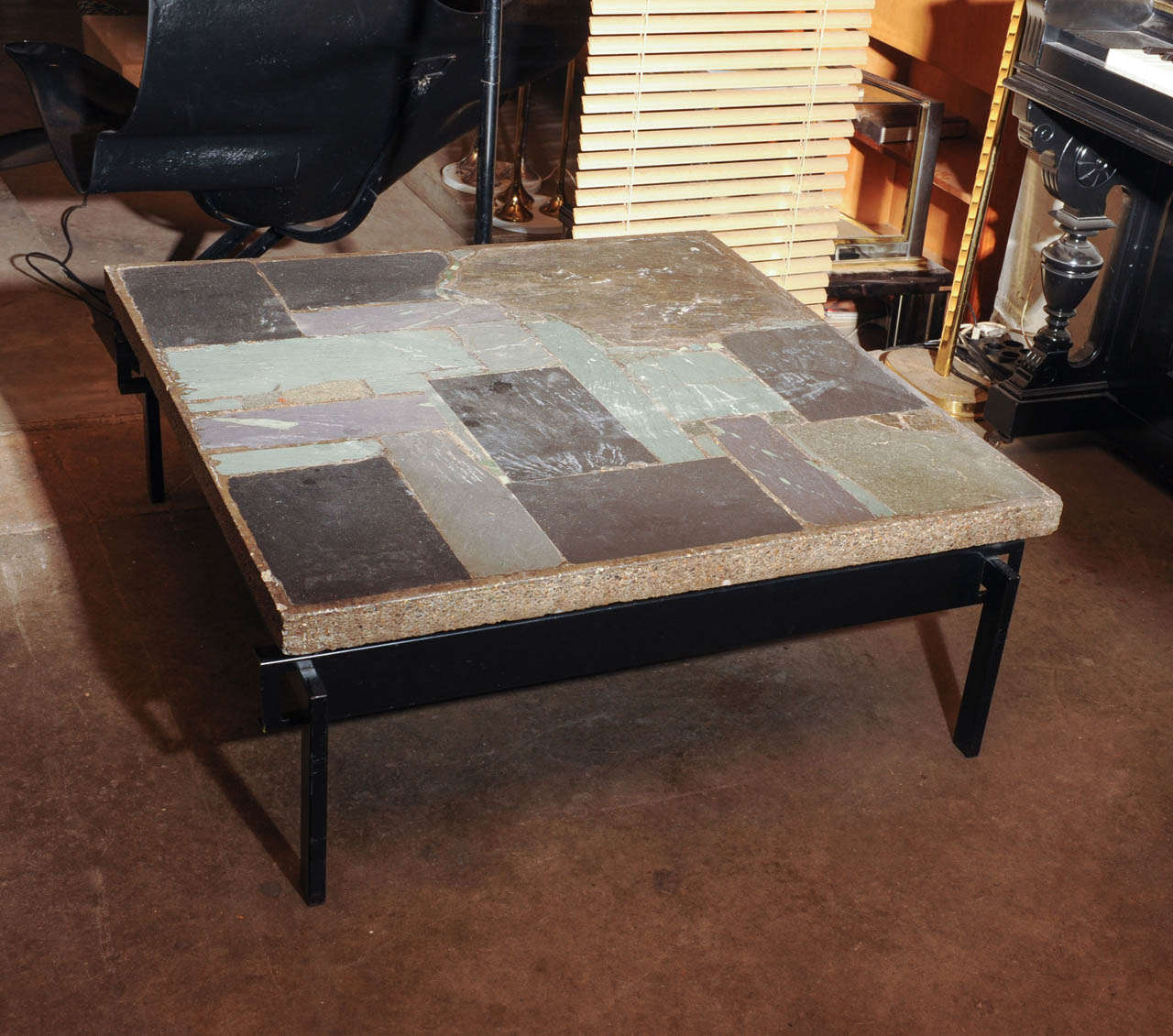 Amazing large square one-of-a-kind coffee table by dutch designer Paul Kingma. Natural slate stone with precious stones inlay in a blue-green-gray tone pattern. Beautiful black lacquered base that holds the top. The table is signed Kingma underneath