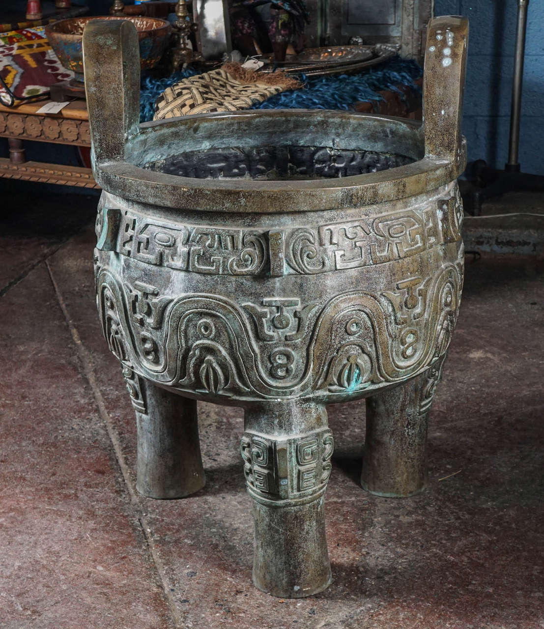 Sculptural Chinese vessel used for cooking, storage and preparation of ritual offerings to ancestors.
Dating back from Xia dynasty to Zhou dynasty, they were associated with power and dominion over land.