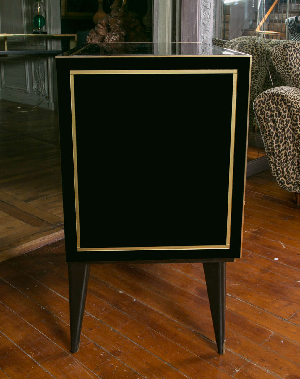 Pair of Black and Gold Mirrored Commodes 1