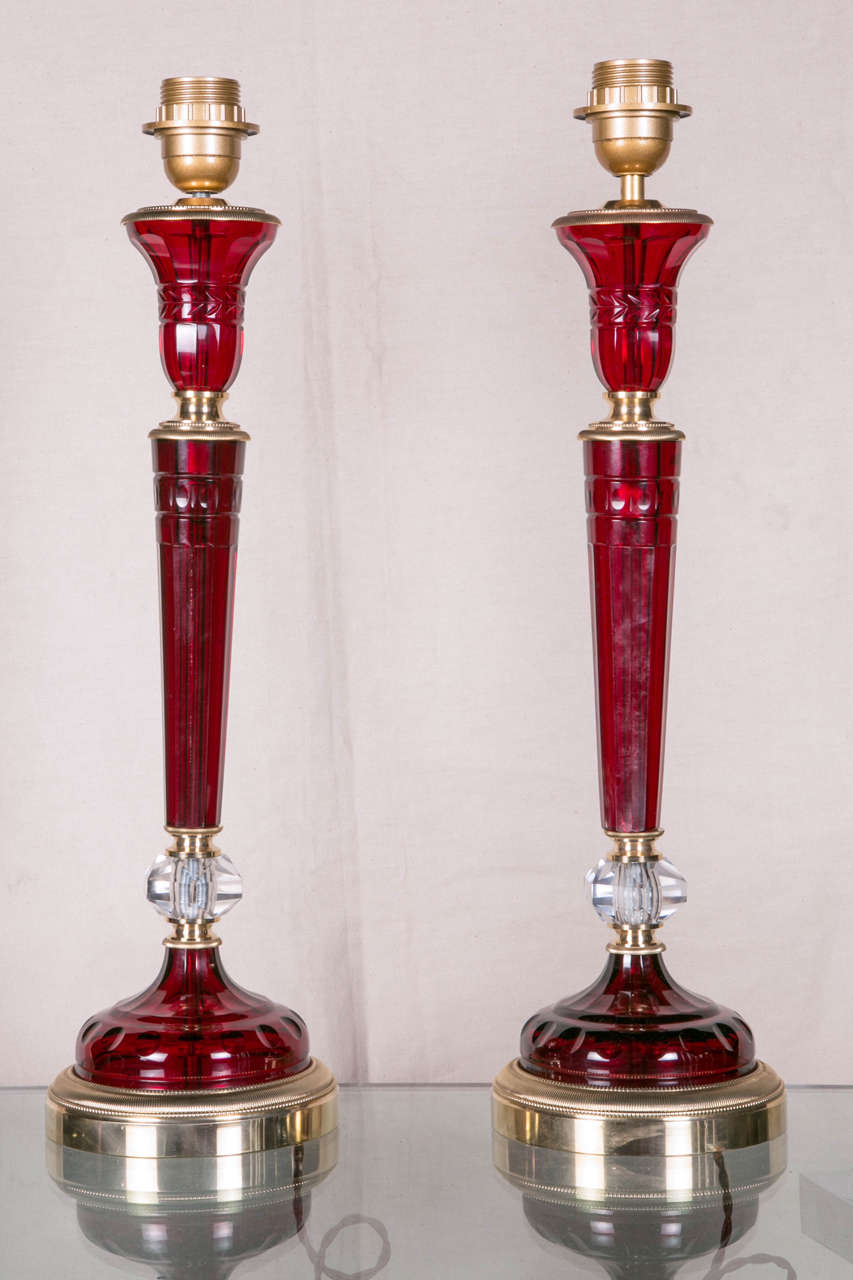 Pair of lamps, thick ruby-red crystal mounted with bronze, circa 1950.