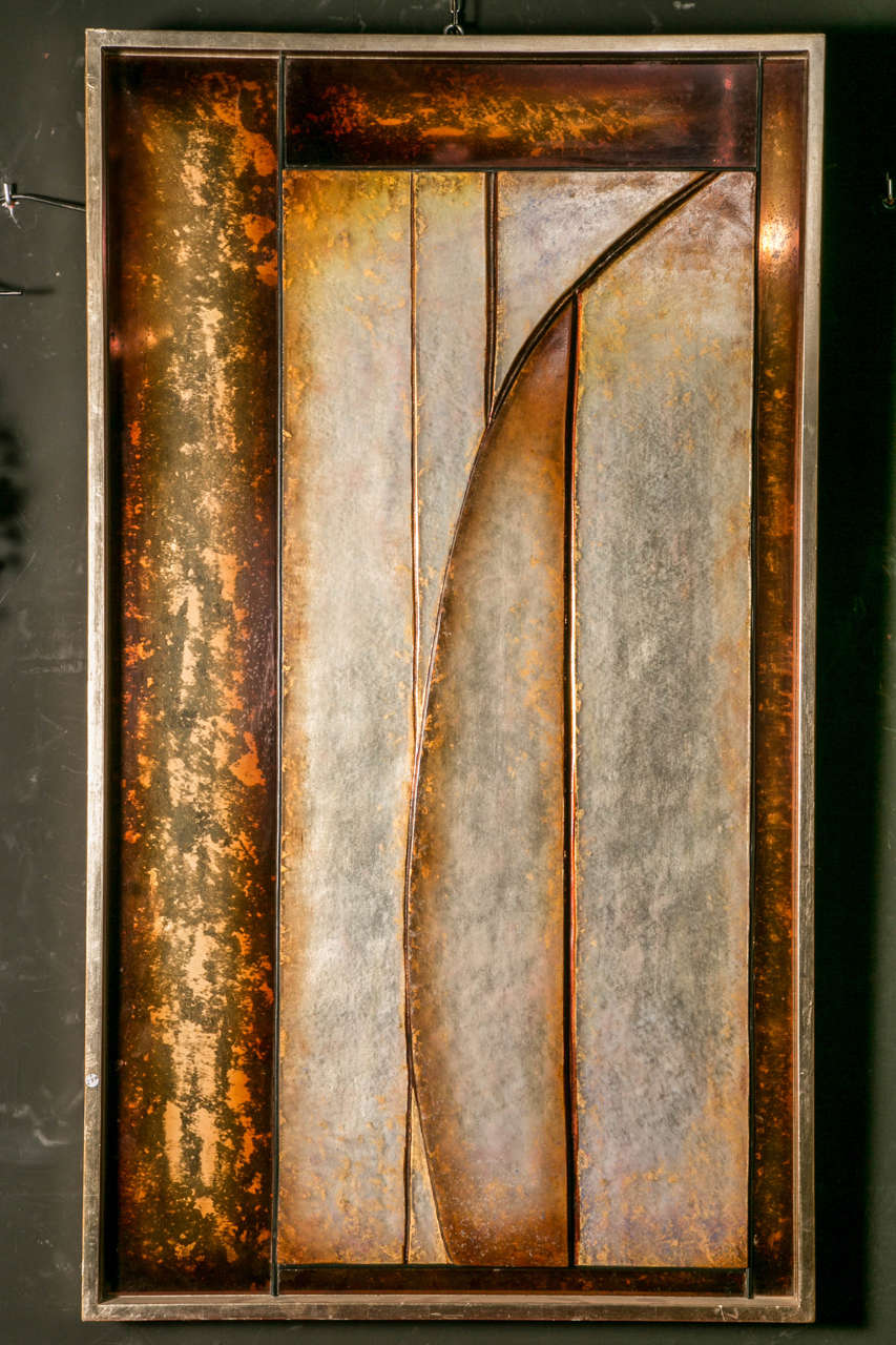 Wall panel, thick carved Lucite with gold powder, on wood.
