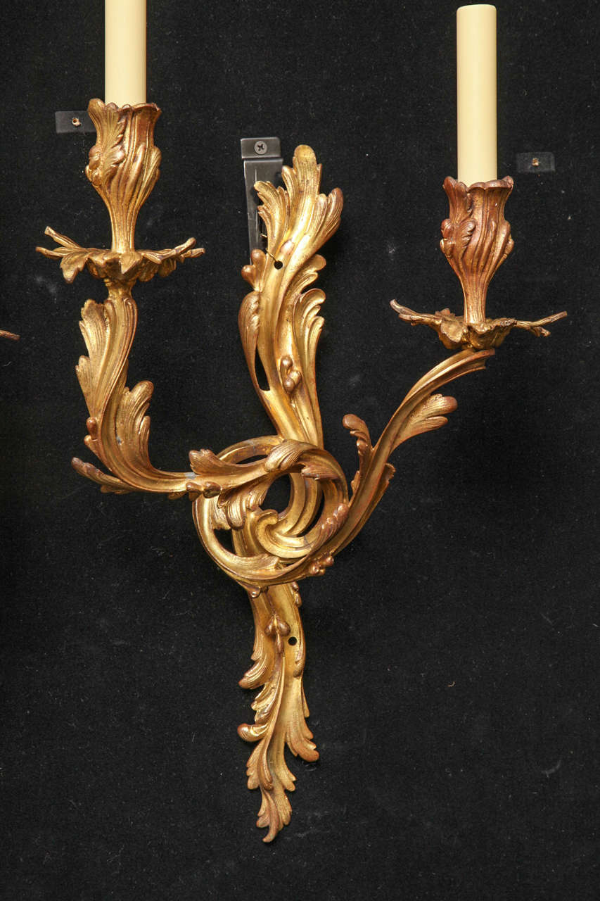 French Louis XV Style Gilt Bronze Left and Right Sconces For Sale