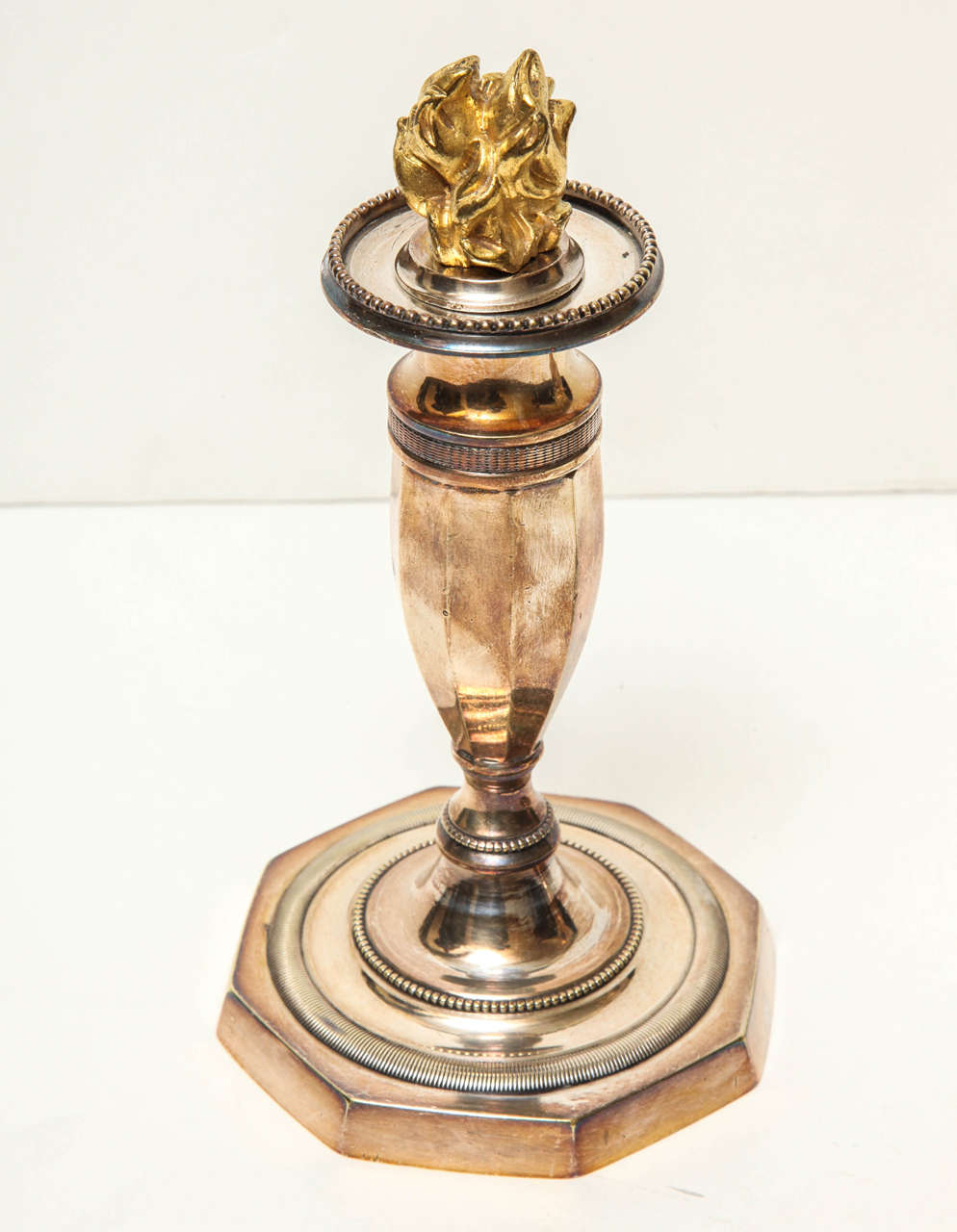 Pair of Silver Directoire Candlesticks with Gold Flames In Excellent Condition For Sale In New York, NY