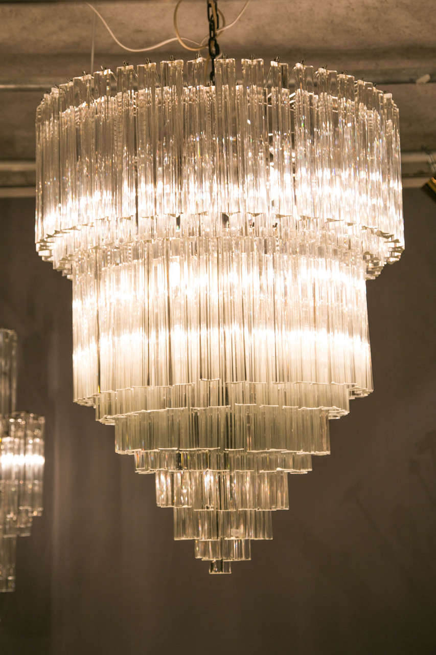 Original impressive Venini glass chandelier from the Copenhague Sheraton hotel. A very nice piece. Pair possible and a smaller one in my warehouse from the same series. They are from the end of the 1970. More photos available on request.