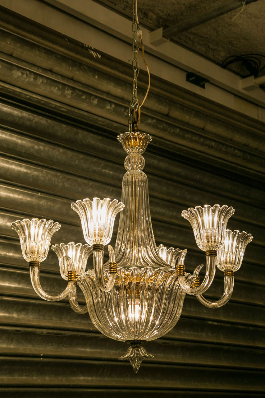 Six-arm glass chandelier. Very elegant and rare to find in perfect condition. A very nice vintage piece.