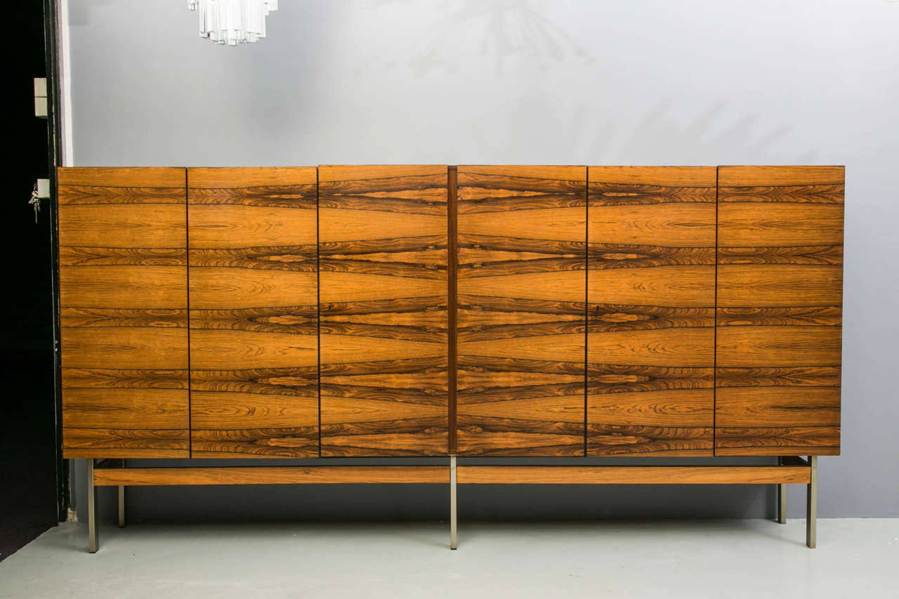 Rare to find elegant rosewood six-door sideboard. Rare German design from the 1970. Comes with the CITES for the Rosewood.