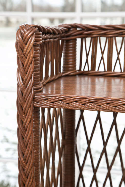 white wicker bookshelf
