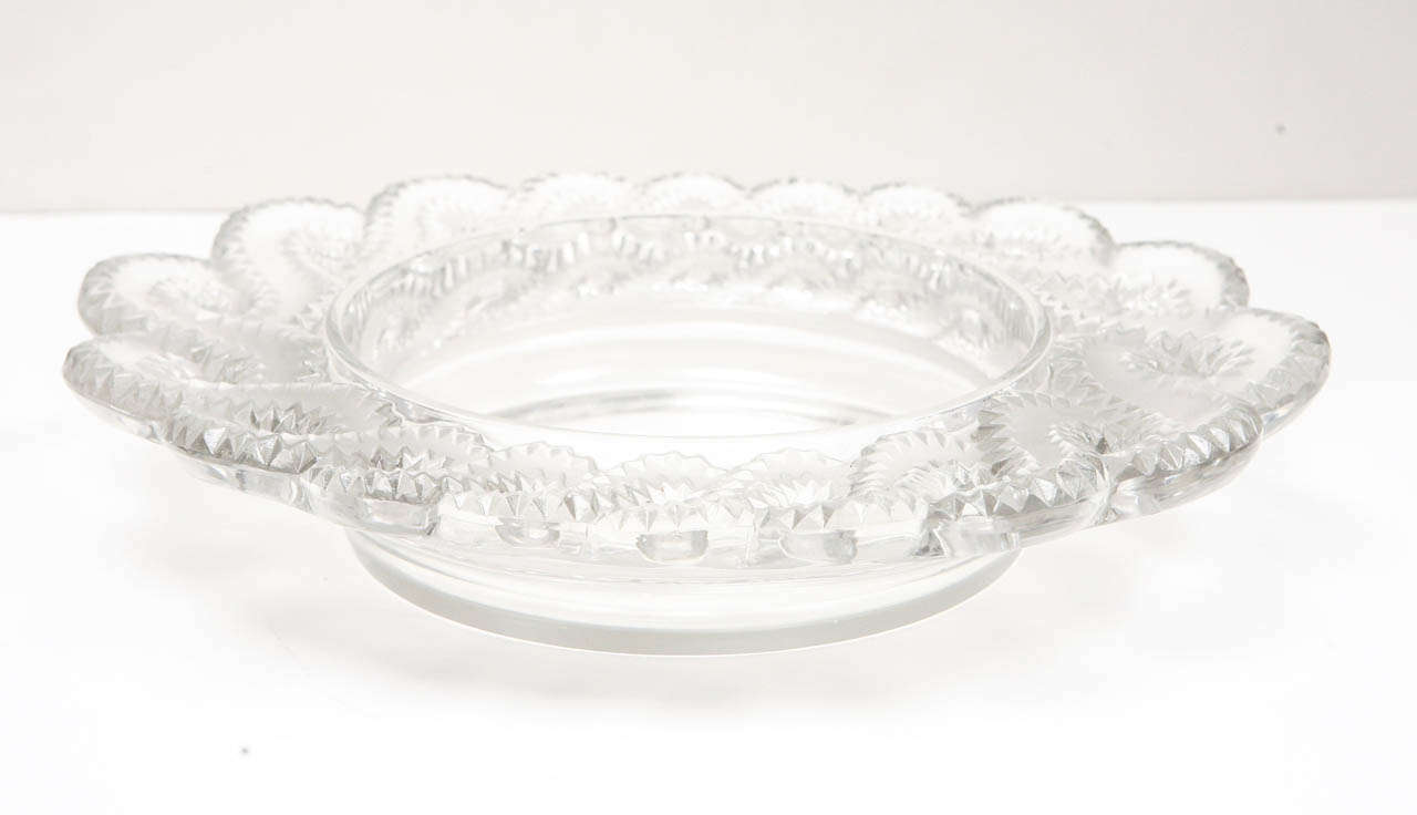 Rare Lalique piece with thick intertwined frosted rim and clear bowl. Signed Lalique, France.