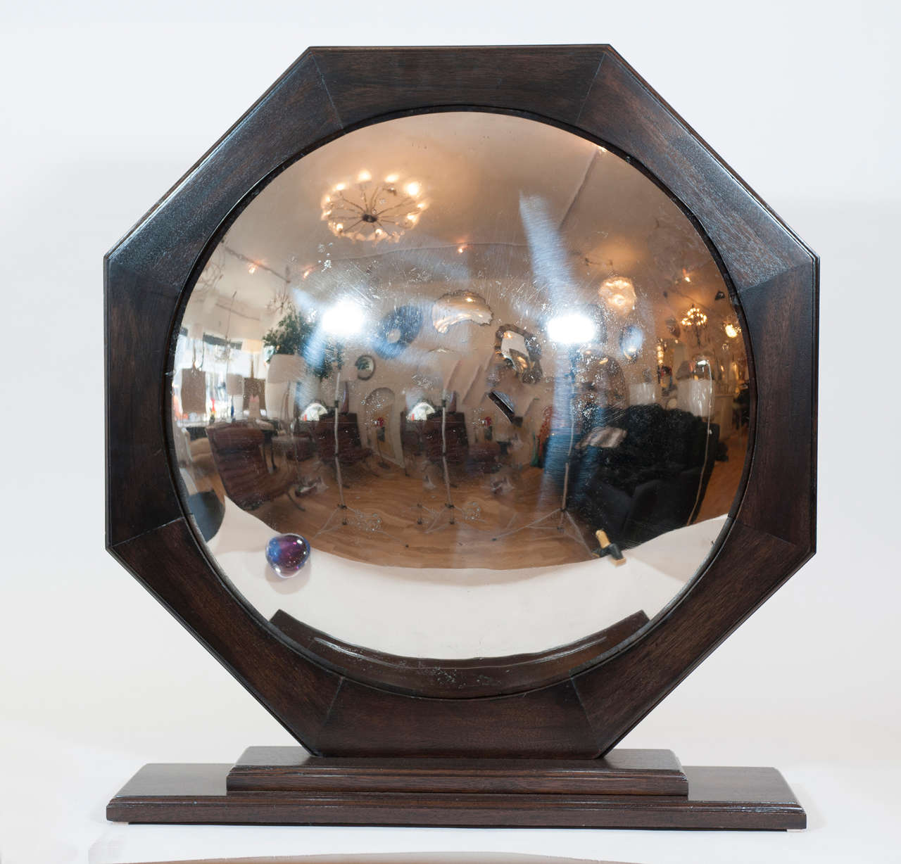 A unique dark wood Arts and Craft period nickel plated convex dome 
fire screen. This fantastic piece is designed to decorate the opening of a fire place but also makes a  beautiful 
sculptural statement on a pedestal, credenza or console.
I