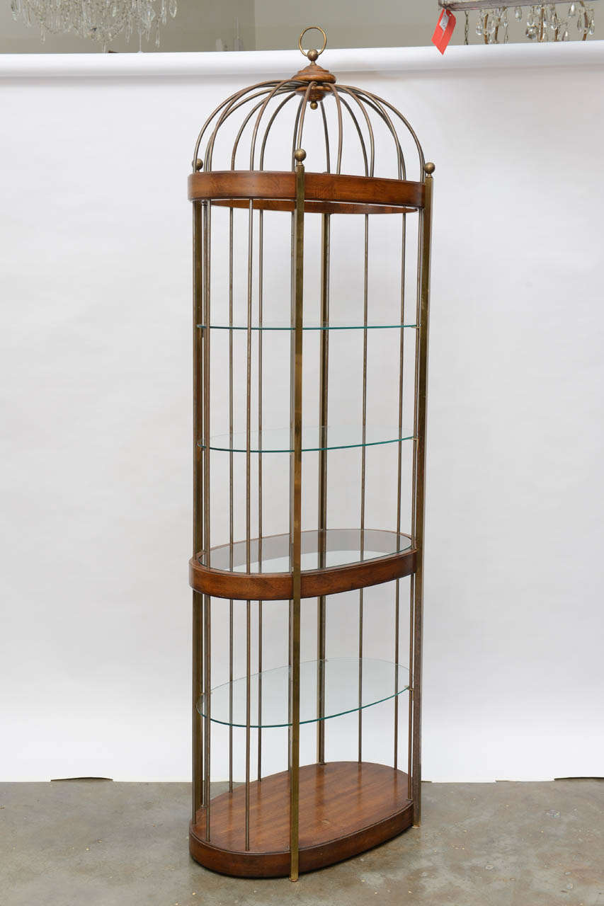 Whimsical mid century modern étagère reminiscent of a birdcage.