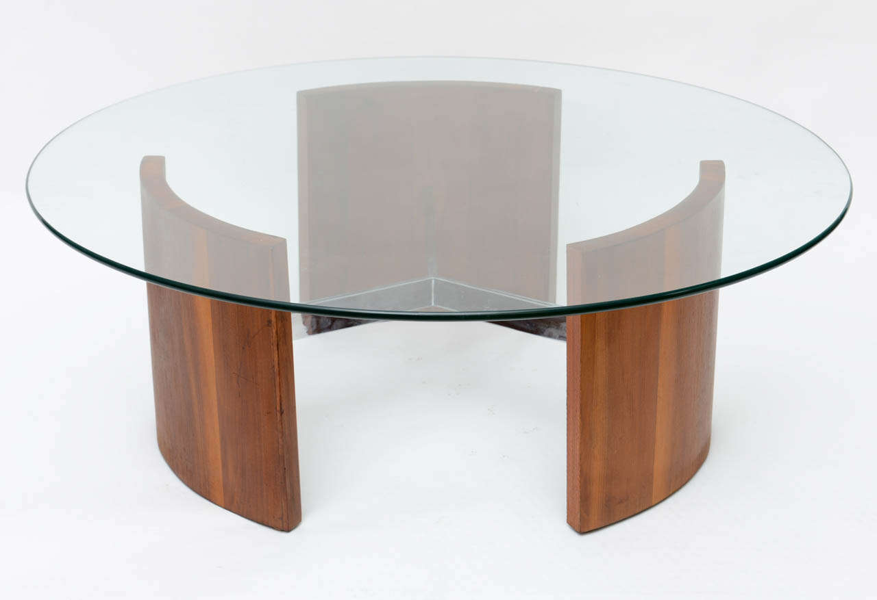 Radial coffee table. Walnut base with flat steel frame.