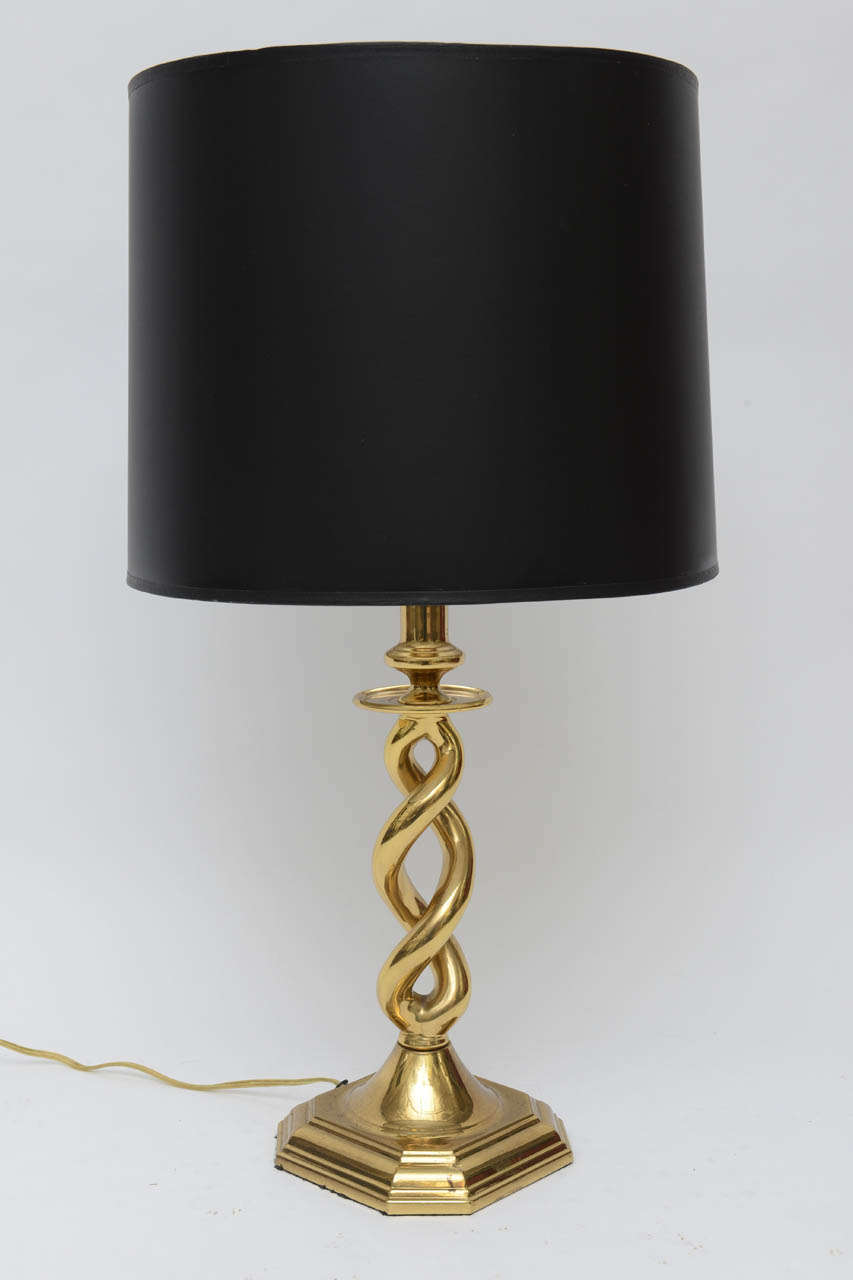 Pair of brass table lamps with twisted base.
