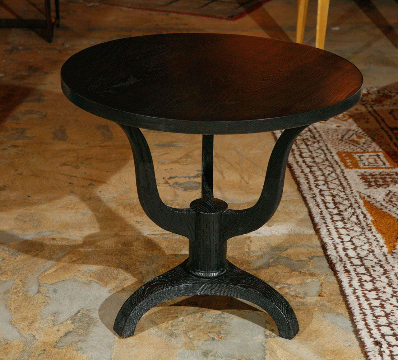 Larger oak side table refinished in distressed ebony.