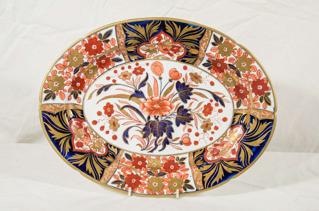 A Coalport platter decorated in an Imari inspired design. Known as the 