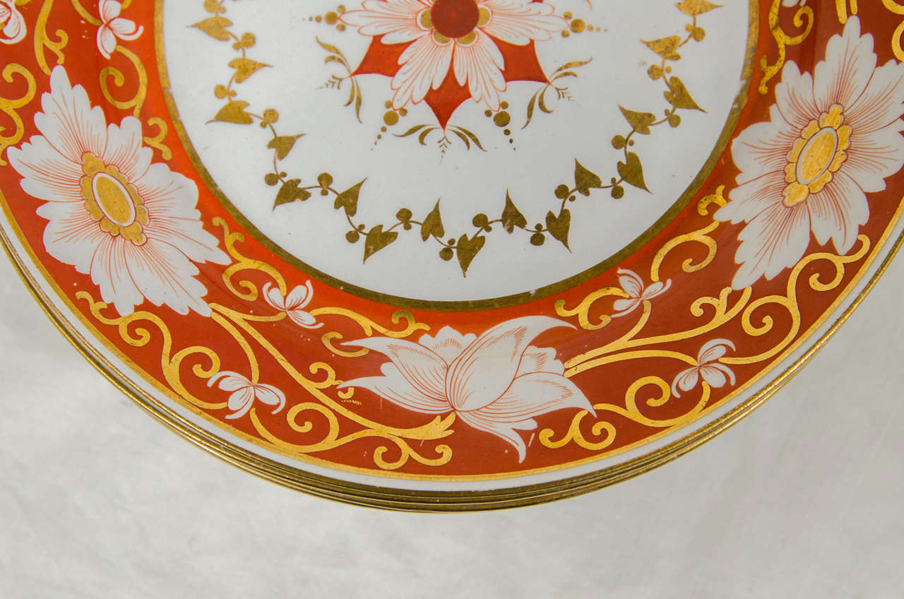 Early 19th Century Set of a Dozen Chamberlain's Worcester Dishes with Orange Blossom Borders