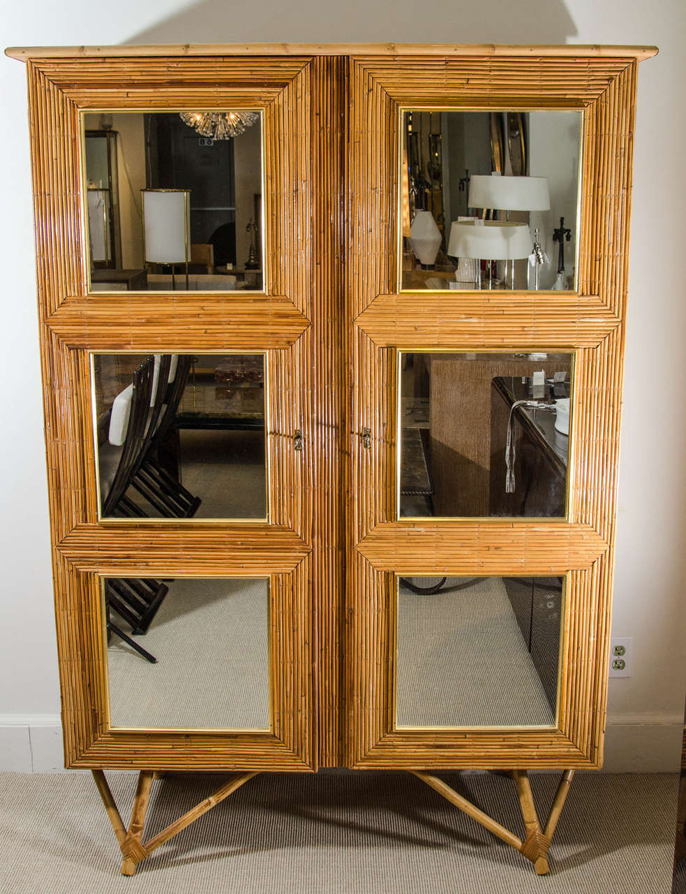 Bamboo cabinet with mirrored glass squares, France, circa 1950-1960.