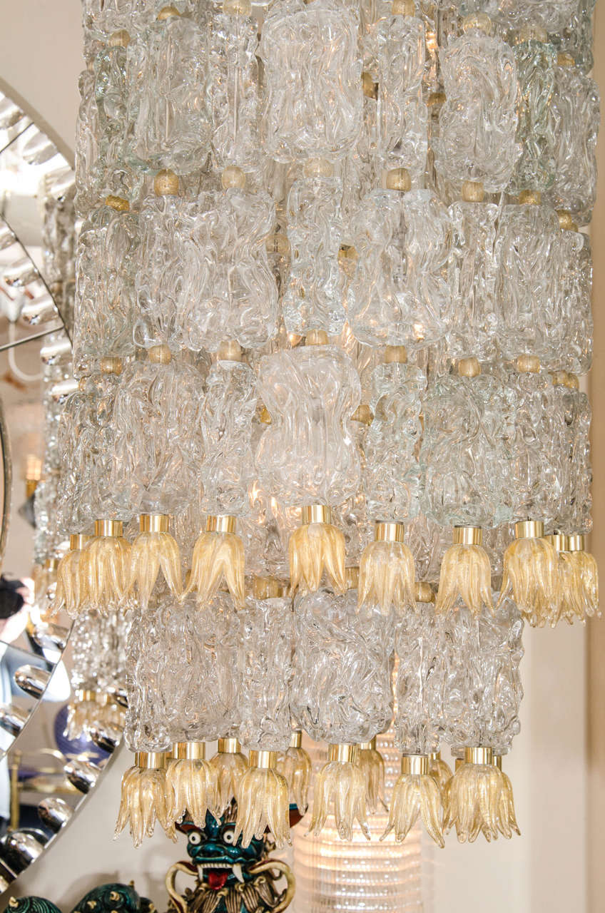 Mid-Century Modern Tiered Chandelier Composed of Textured Glass Elements