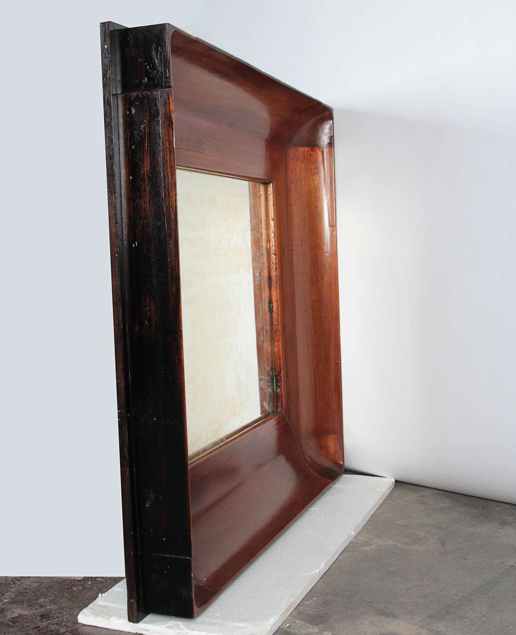 Wooden Concave Framed Patina Mirror In Good Condition For Sale In New York, NY
