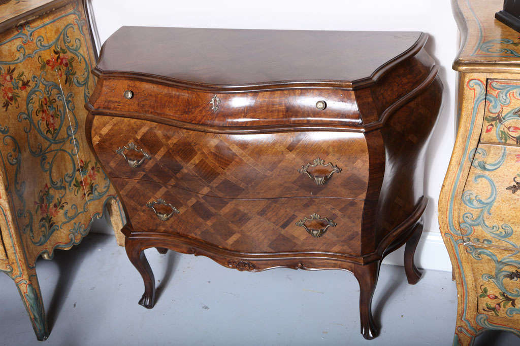Beautiful marquetry three drawer chest with bronze pulls.