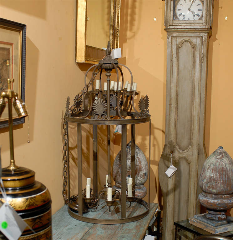 20th century large iron six-candle lantern with antherium motif
New wiring.
