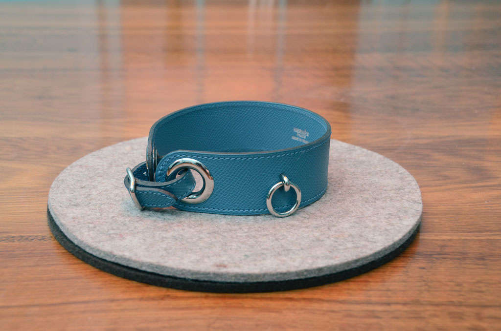 Vivid blue Calfskin Dog Collar with Metal Grommets and Adjustable Strap.  Stamped inside the Collar in (in silver) HERMES