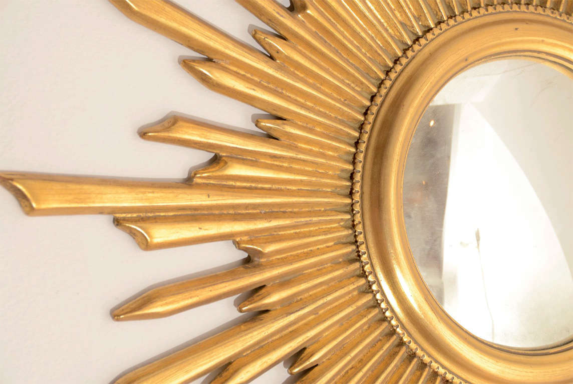 An attractive double ray giltwood mirror.  The diameter of the convex mirror is 7