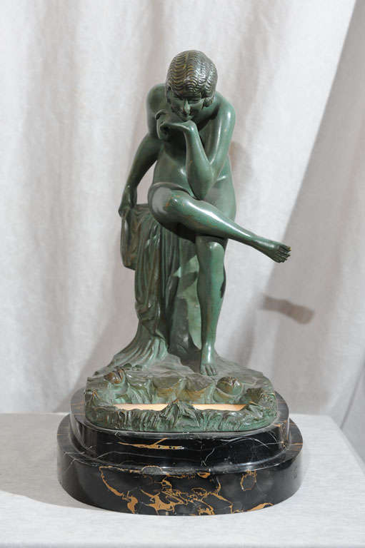 This luscious green patinated bronze is artist signed 