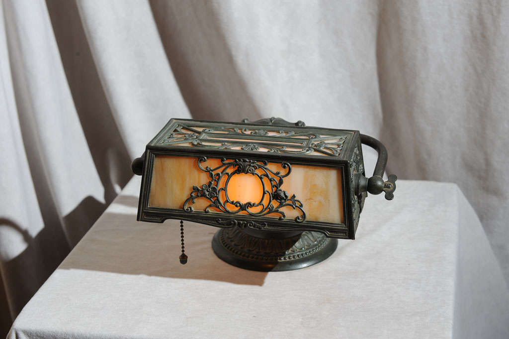This very fine example of a Wilkinson panel lamp shows off his beautiful metal work.  Wilkinson was a company out of Brooklyn, NY that worked in the first quarter of the 20th Century.  Although unsigned, we guarantee this to be by the Wilkinson