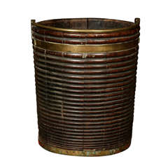 A George III Mahogany and brass bound peat bucket