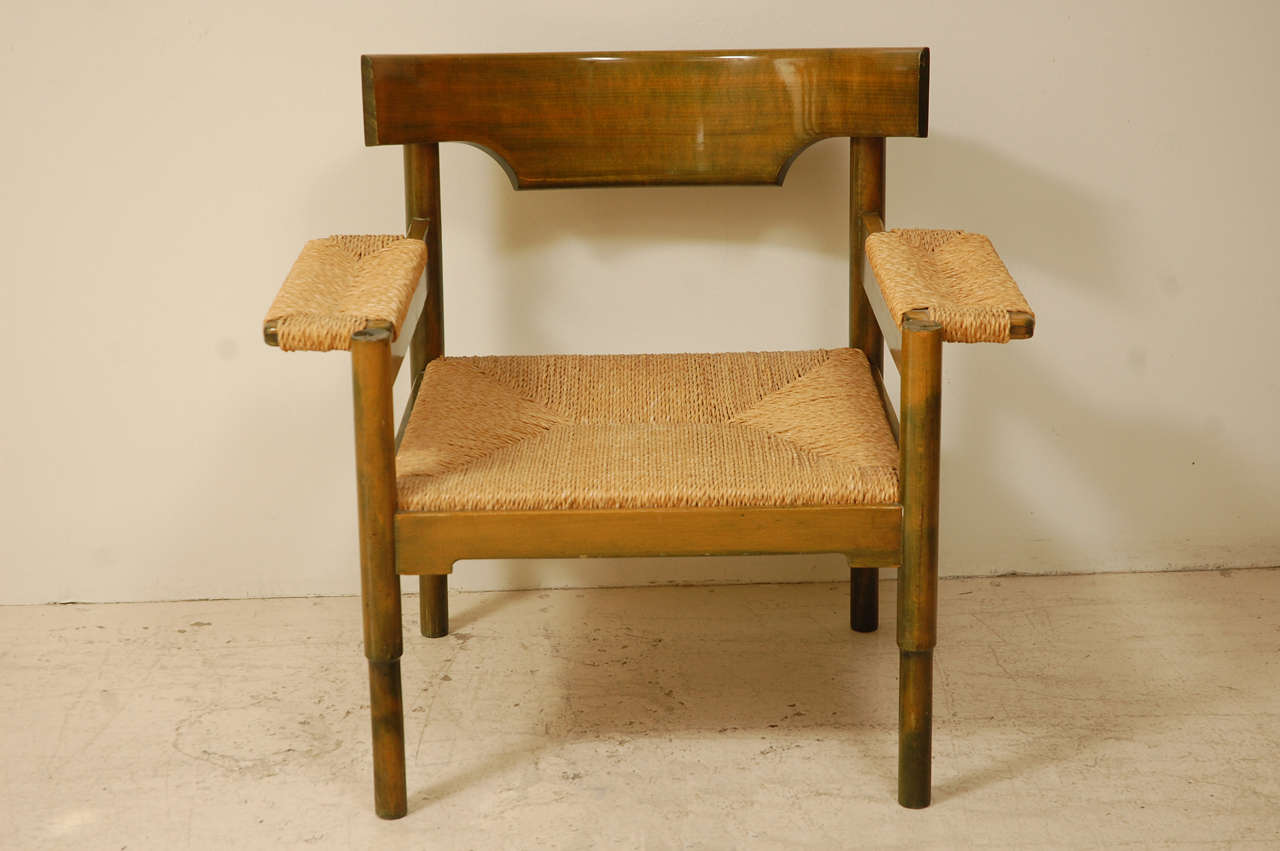 Single beech and caned chair in the style of Magistretti.
