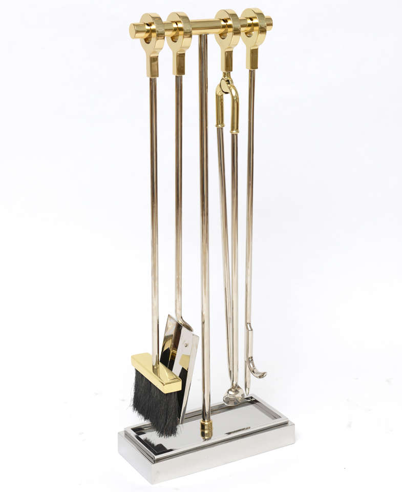 Superior quality set of solid brass and nickeled steel fireplace tools in the manner of Karl Springer. Restored. 
