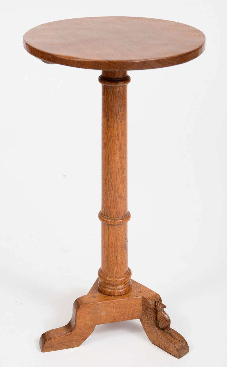 A Robert Thompson “Mouseman” (1876-1955) Unusual Oak Wine Table.
Adzed top above a ring turned column on a triform base.
Carved mouse.
English
Circa 1930.
31cms diam x 60cms high

Prov; Lingholm, Cumbria. The Mouseman table was commissioned