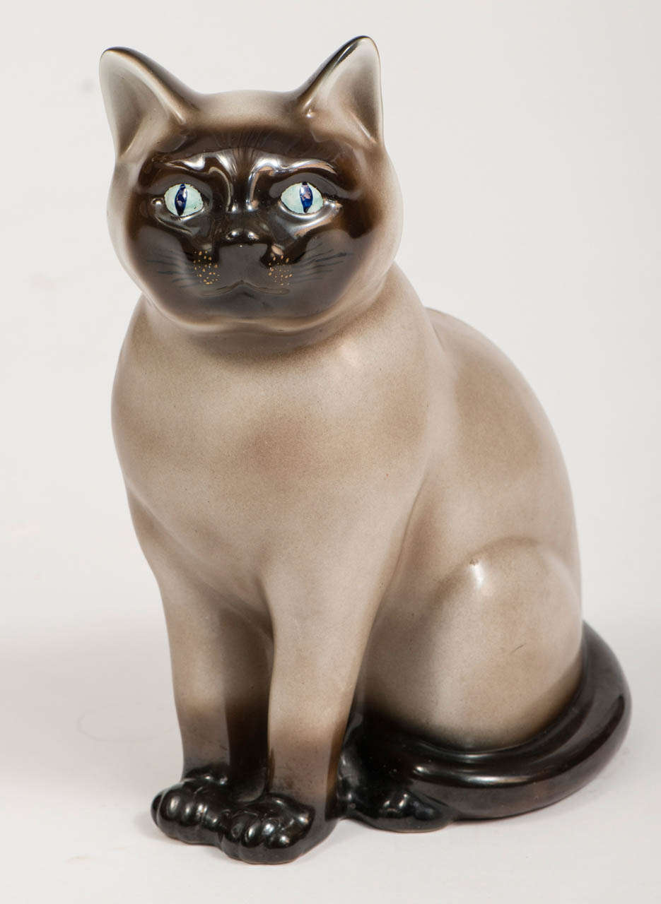 A Fornasetti Life-size Ceramic Cat.
Depicting a Siamese Cat in vivid colours.
Signature to back.
Italy, circa 1960
31 h  x 21 w  x 17 d cm