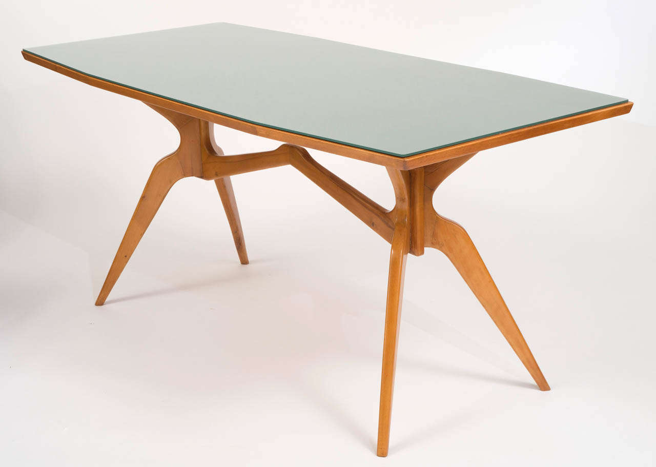 An Italian Beech Centre Table attributed to Franco Campo & Carlo Graffi.
The splayed spider legs supporting a rectangular shaped top with original glass.
Italian
Circa 1950.
78 H x 170 W x 81 cms D.