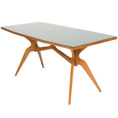 An Italian Beech Centre Table attributed to Franco Campo & Carlo Graffi.