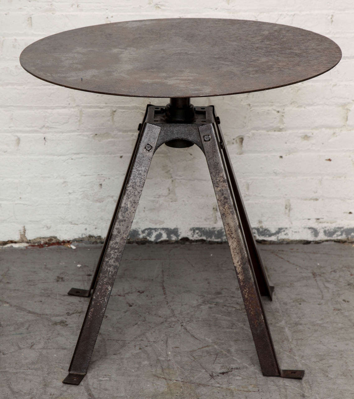 Industrial rotating top table in two pieces.
