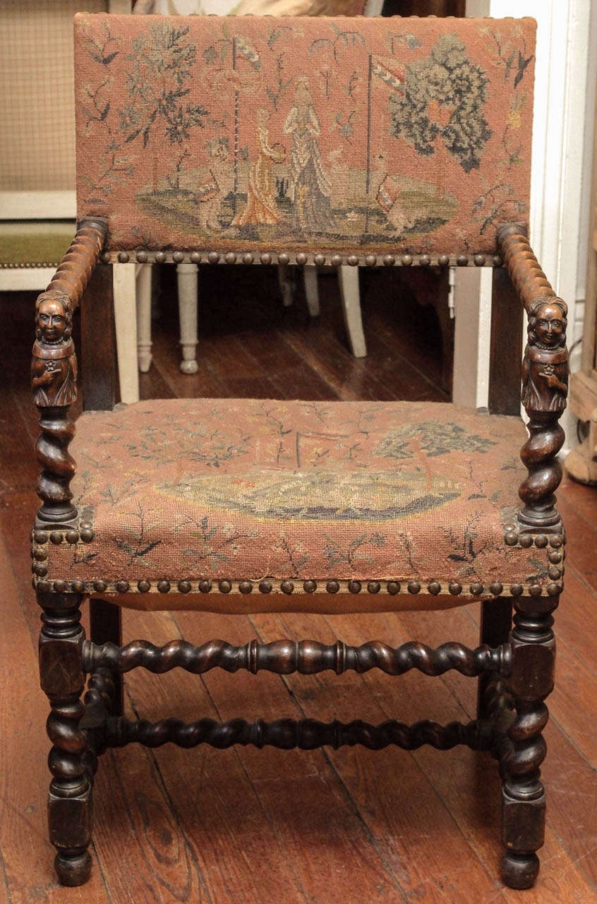 Barley twist walnut pair of fauteuils in the style of Louis XIII with the figure of a lady carved in each arm