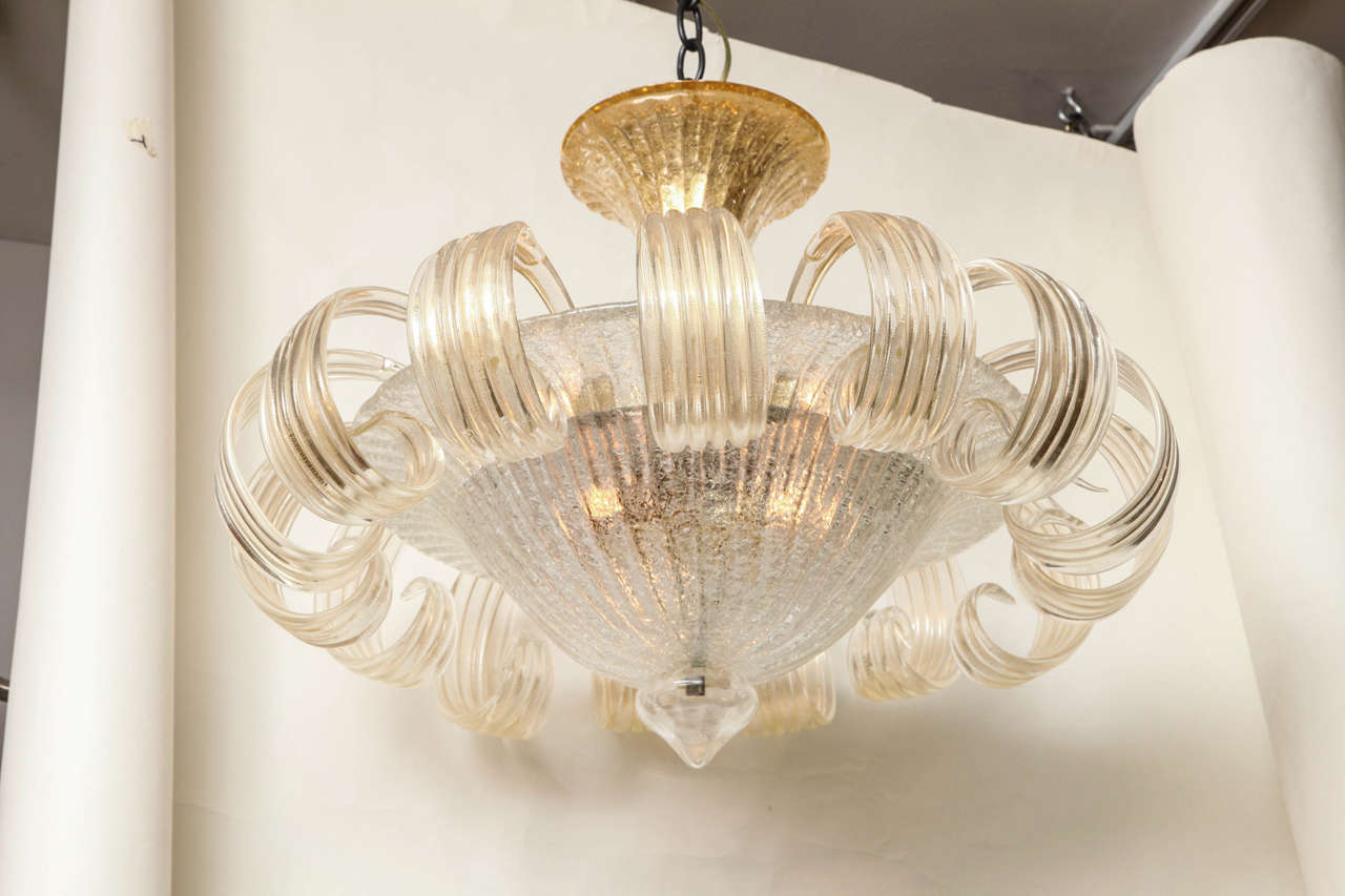 A hand-blown Venetian glass ceiling light with vase shaped gold flecked Murano glass dish issuing glass leaves. The canopy and finial on underside of dish also made of hand-blown glass.