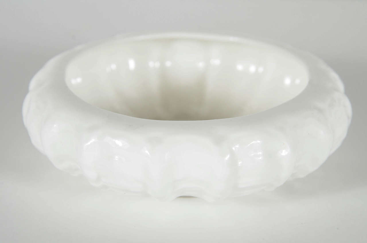 This beautiful bowl features a stylized urchin form design and it is signed Coalport bone china.