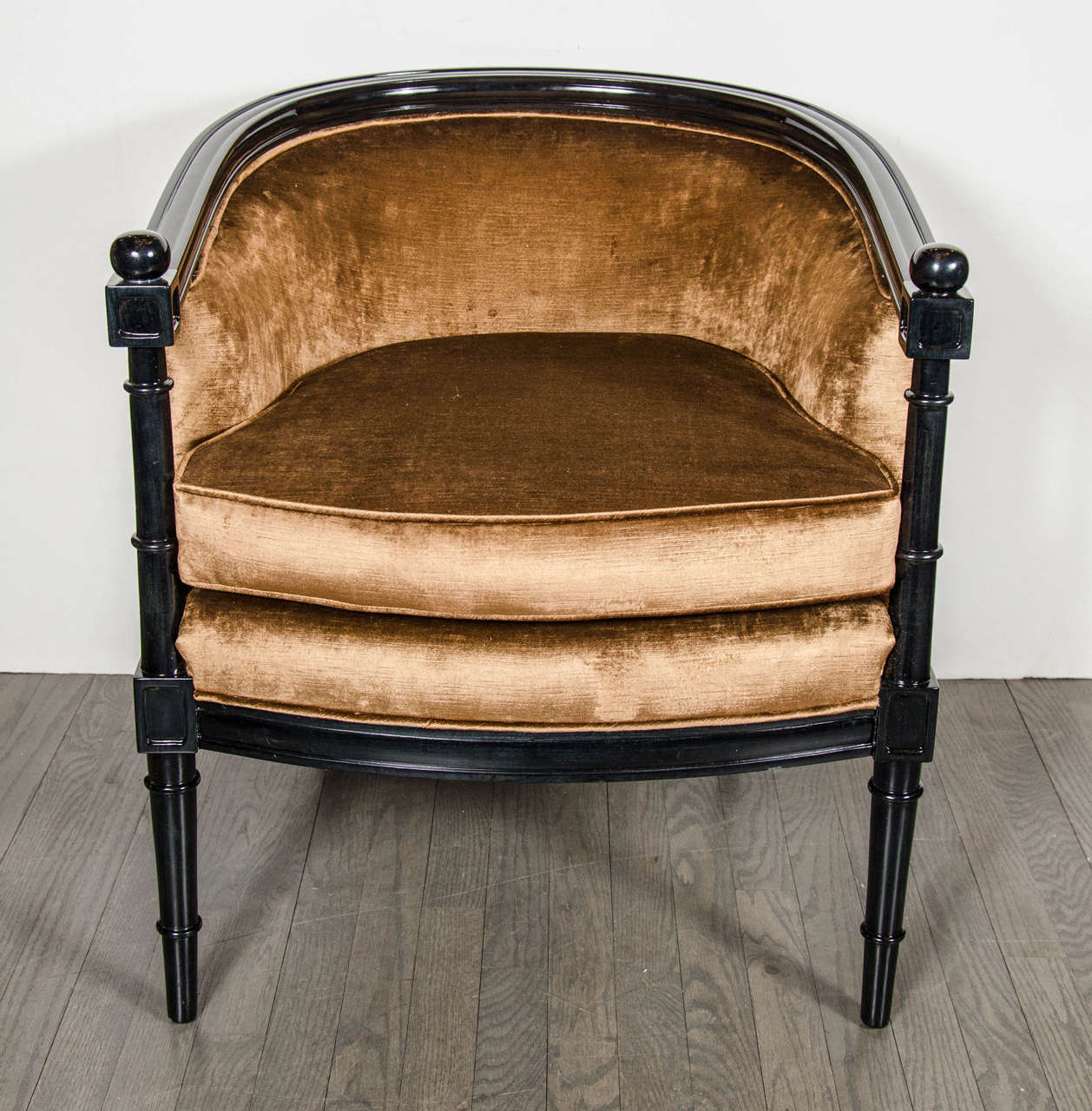 Pair of Mid-Century Modernist balustrade form occasional chairs upholstered in a lux, rich tobacco velvet. This pair of occasional chairs has ebonized walnut frames that feature balustrade form vertical supports that connect the chairs rounded