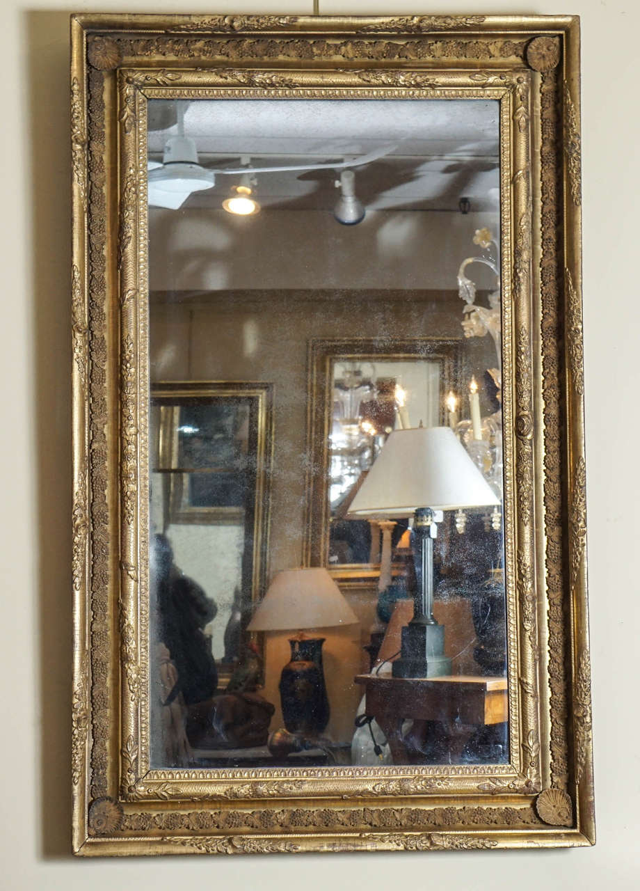 English Regency mirror with original gilding and glass.